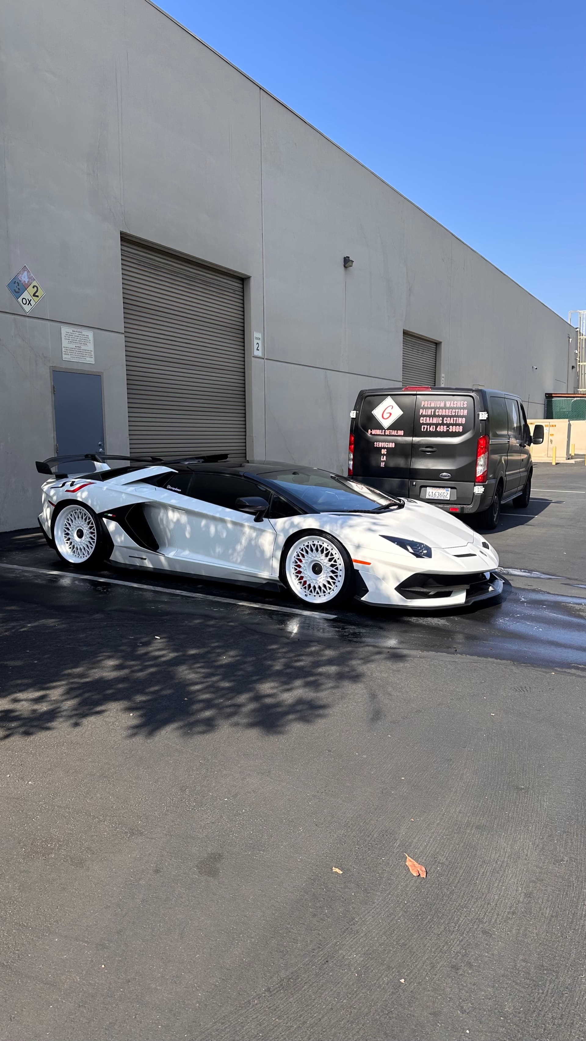 White Lamborghini Aventador SVJ mobile detail with G Mobile van