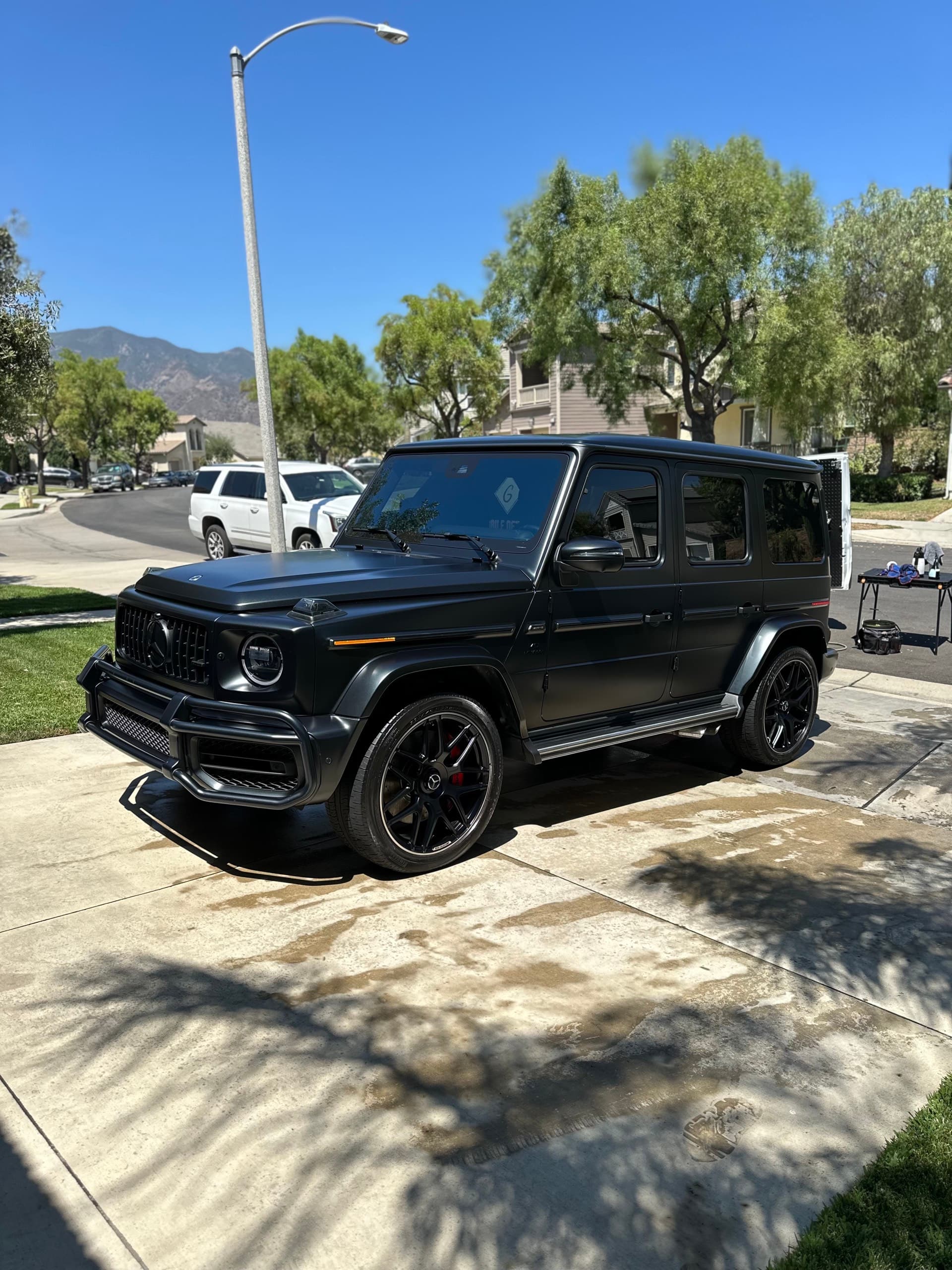 Black Mercedes G-Wagon detailed on driveway in Orange County